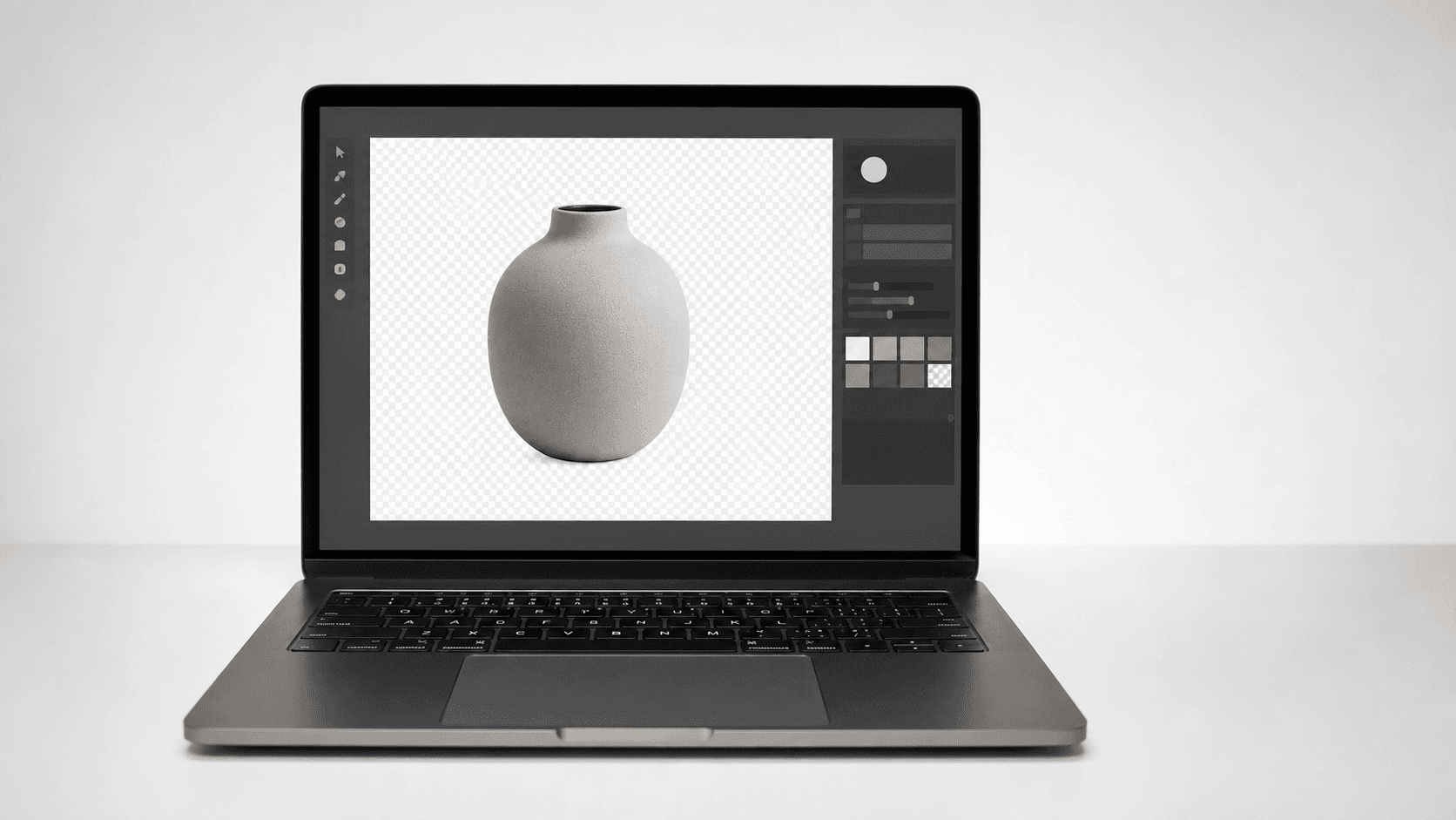 Notebook com uma foto de produto recortada sobre fundo cinza claro