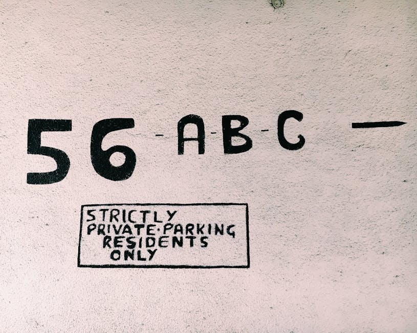 Strictly private parking sign displaying number 56, ABC, and residents only notice